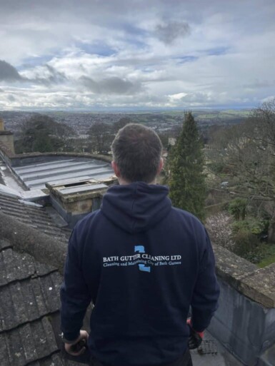 Rooftop view of gutter cleaning in Bath and surrounding Somerset areas
