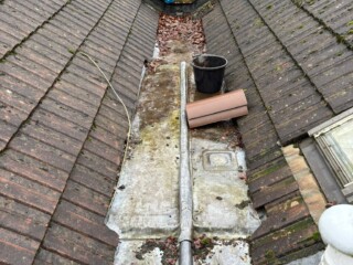 Cleaning away the rest of teh debris now water has been removed